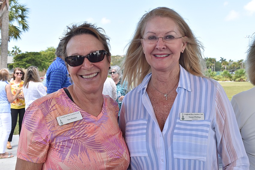 Dee Harmer and Susan Phillips get ready for the meeting.