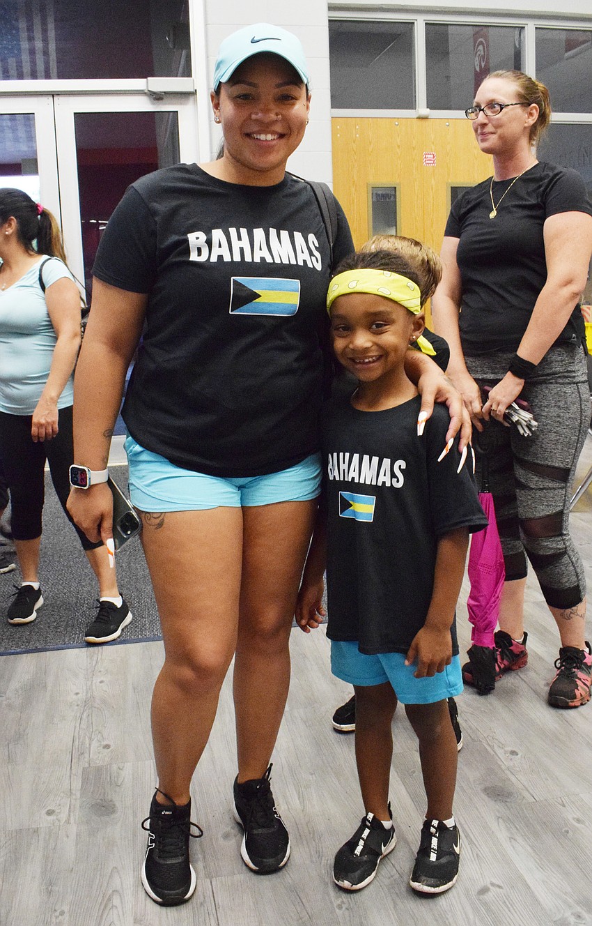 Hannah Ballou and her kindergartner Jakih Ballou dress in matching Bahamas shirts. Hannah Ballou says the Bahamas is a place they would like to visit some day.