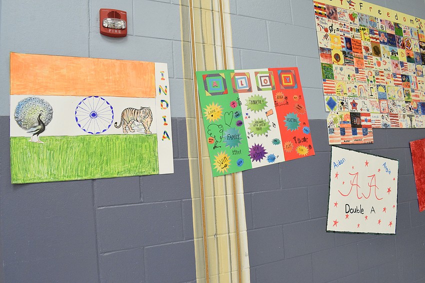 Mothers and sons create their own flags and country names.