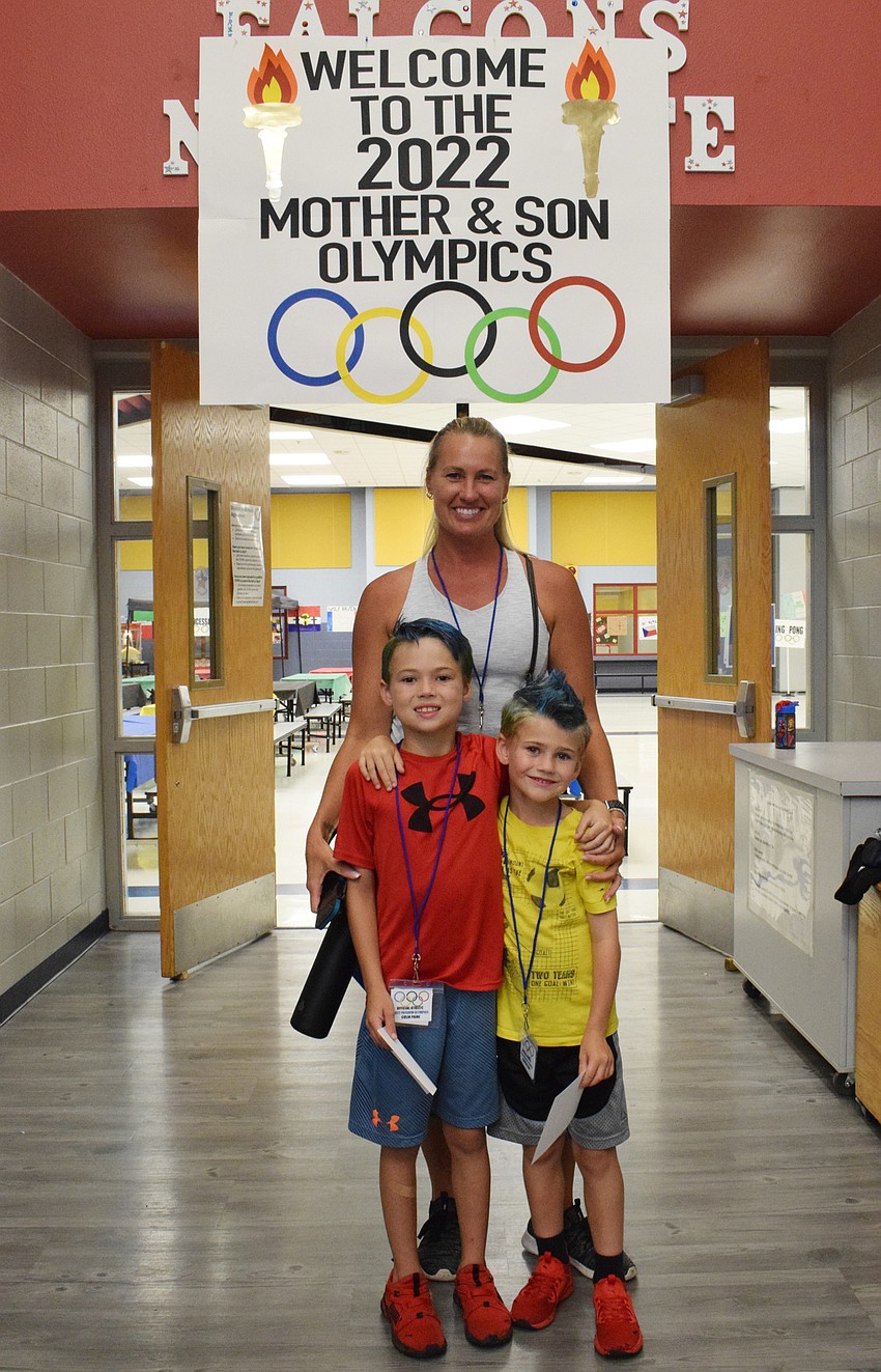 Tara Paine and her third grader Colin Paine and kindergartner Quentin Paine can't wait to spend time together while competing in different events.