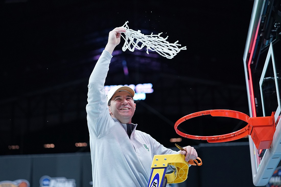 Scott Drew and the Baylor men&#39;s basketball team cut down the nets on their way to a national championship in 2021. Drew will be an honoree at the 2022 Dick Vitale Gala. Photo courtesy Baylor Athletics.