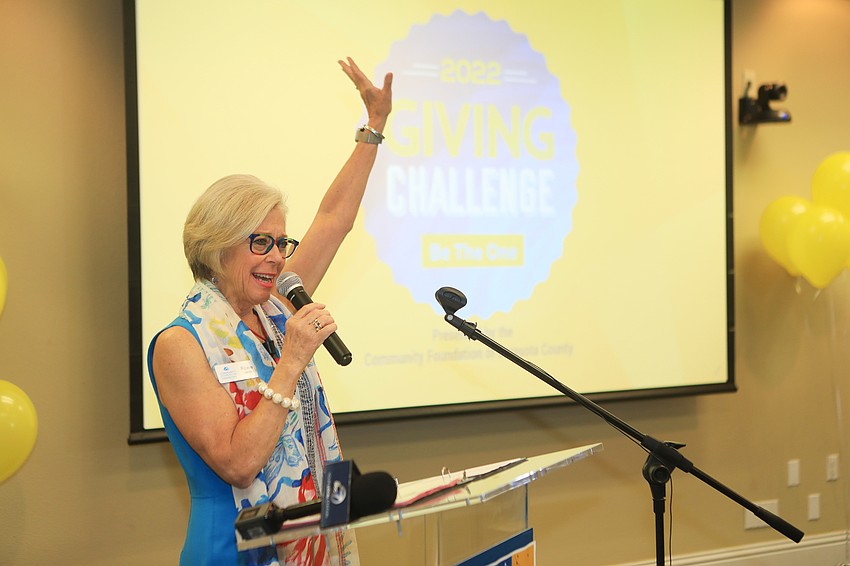 Community Foundation of Sarasota County president Roxie Jerde kicks off the reveal.