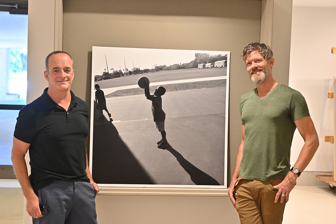 Alan Cresto and Robert Rogers helped usher this photography project into a full-blown museum exhibit. (Photo: Spencer Fordin)
