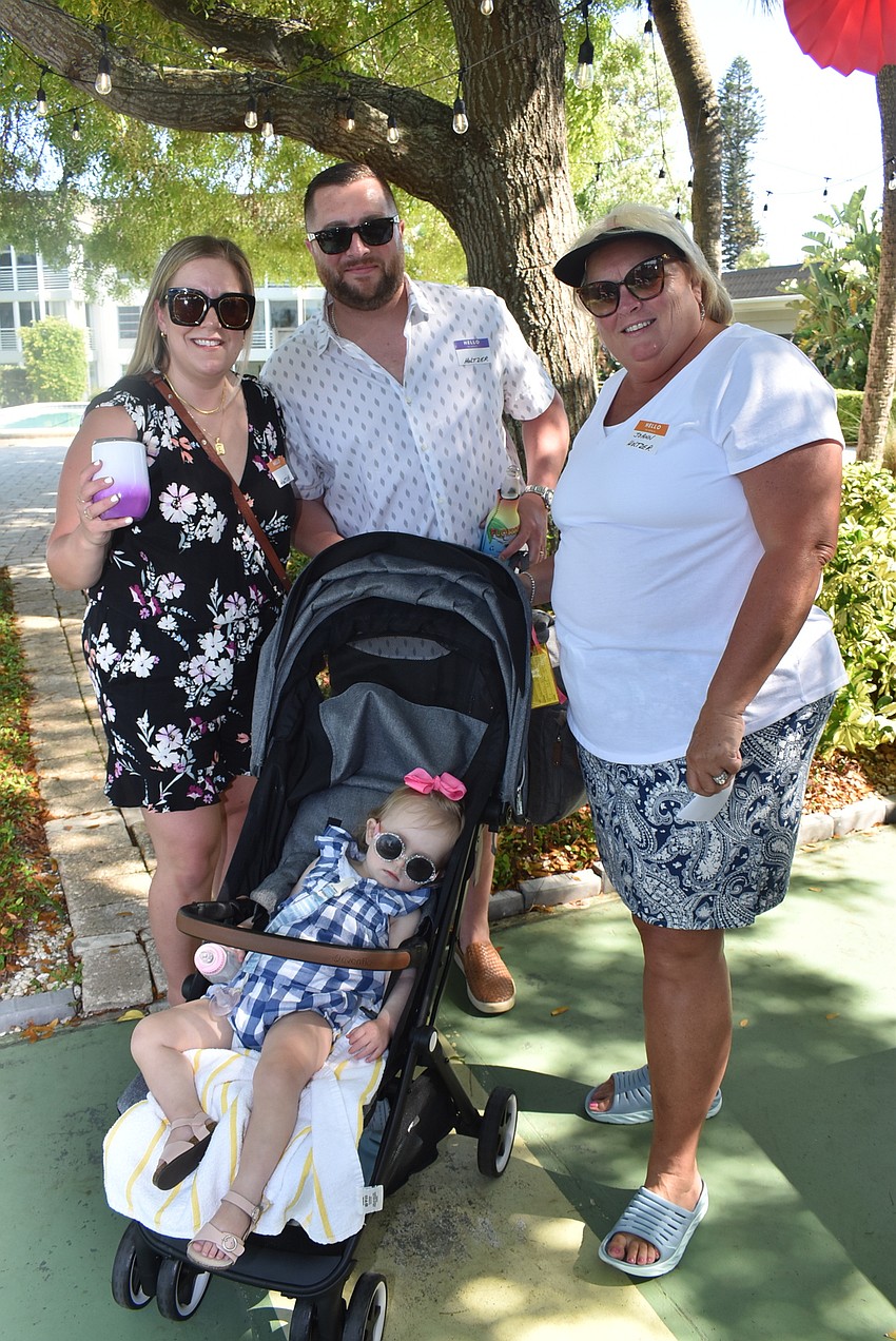 Alex, George, Joann and Aubrey Holtzer arrive.