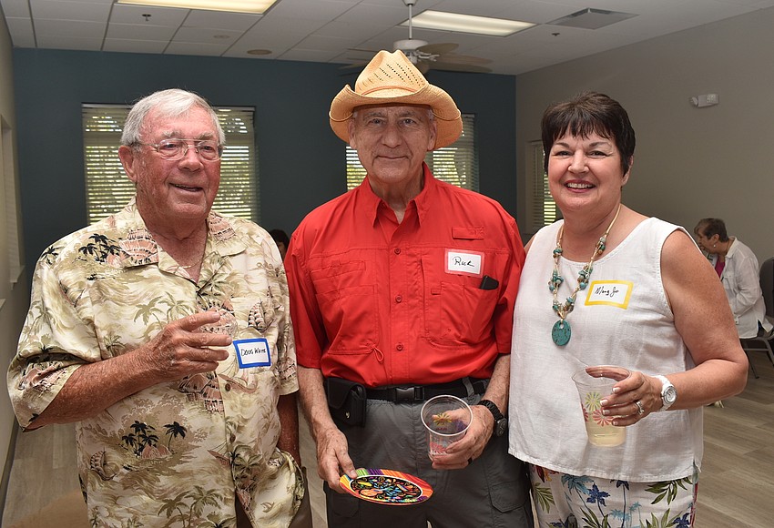 Your Observer Photo Doug White with Rick and Mary Jo Stauffer.