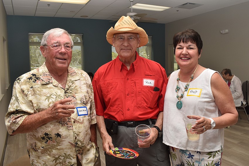 Doug White with Rick and Mary Jo Stauffer.