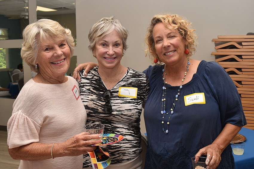 Barbara Pappas, Judy Lomax and Sandi Love caught up at the party.