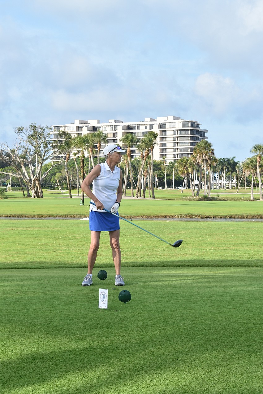 Katrin Burnie watches a drive head out.