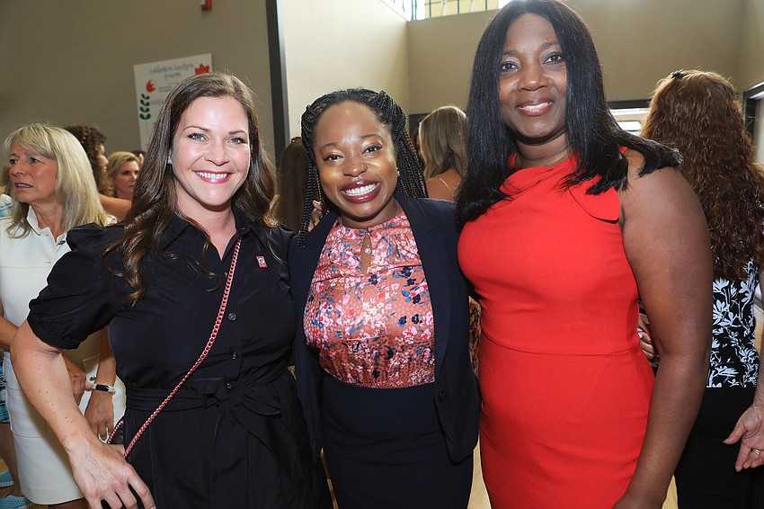 Knickole Barger, Tamara Williams and board chair LaShawn Frost