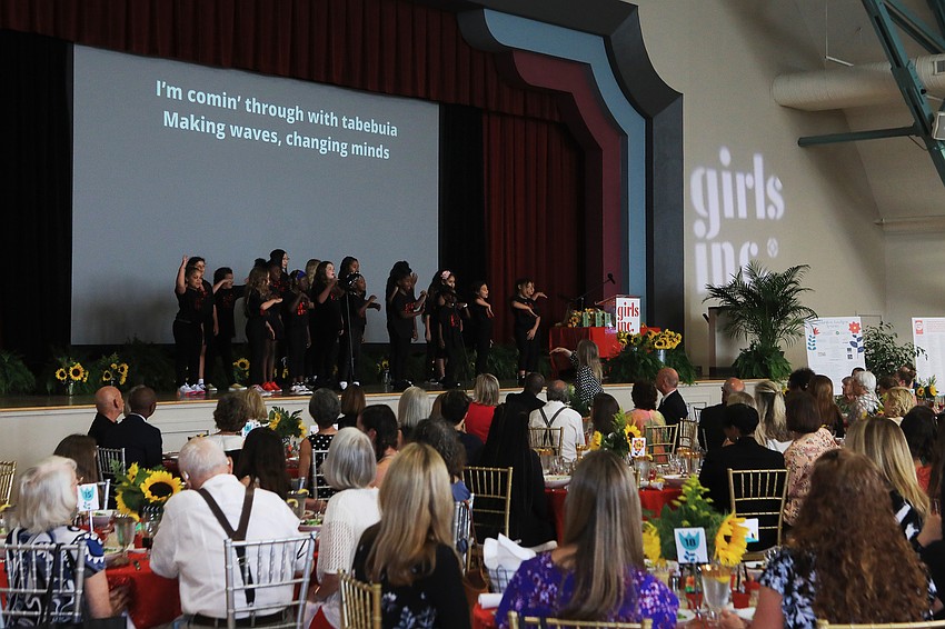 The program started with singing from the Girls Inc. choir.