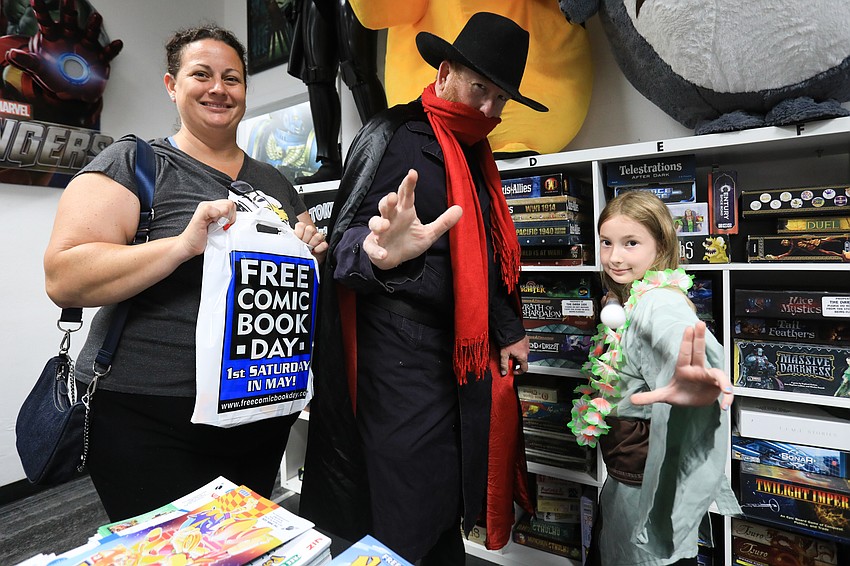 Crystal, Russell and Magnolia Kasper dress up for FCBD.