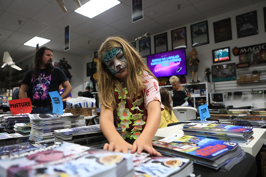 Rianna Greene organizes comics.