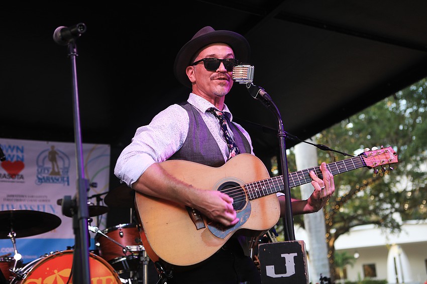 The crowd listen to all sorts of folk music.