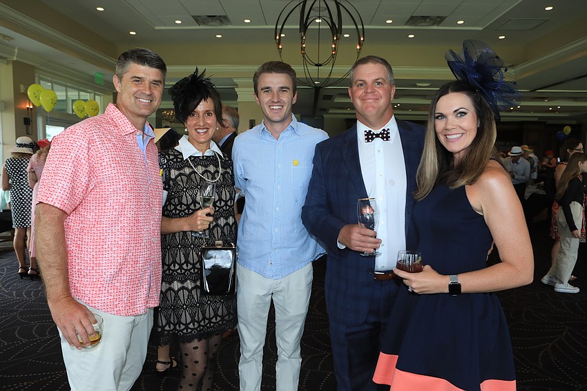 Mike, Amy and Jacob Reeves with Tom and Tiffany Daly