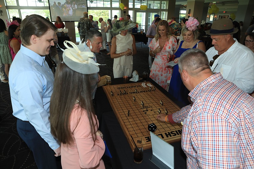 Guests played games during the cocktail hour.