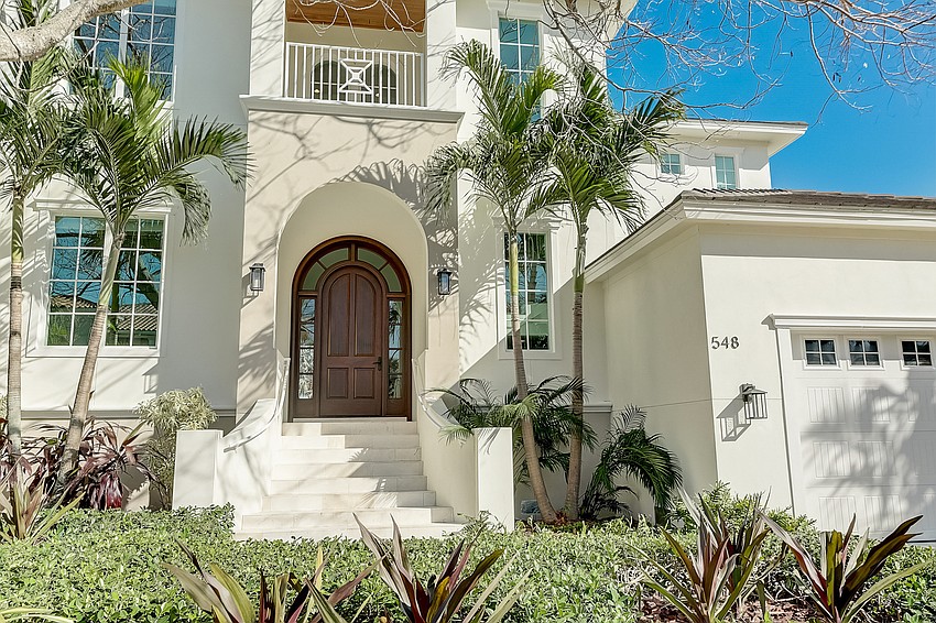 The home is situated three lots west of Sarasota Bay on a canal. (Photos courtesy Melissa Perrigoue with Coldwell Banker Realty)