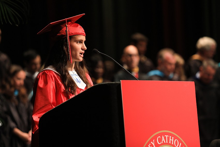 Senior class president Jenna Santiago leads the invocation.