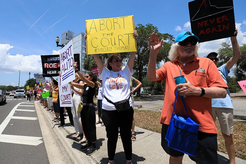 Hundreds marched through the Rosemary District.