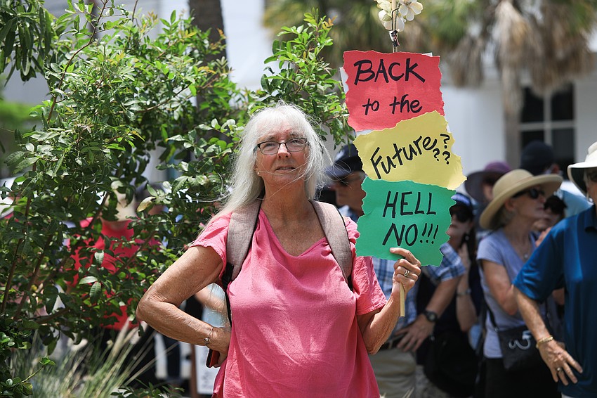 Jan Dorsett brought her sign to the protest.