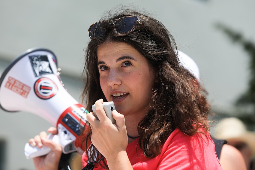 Eden Glickman speaks to the crowd.