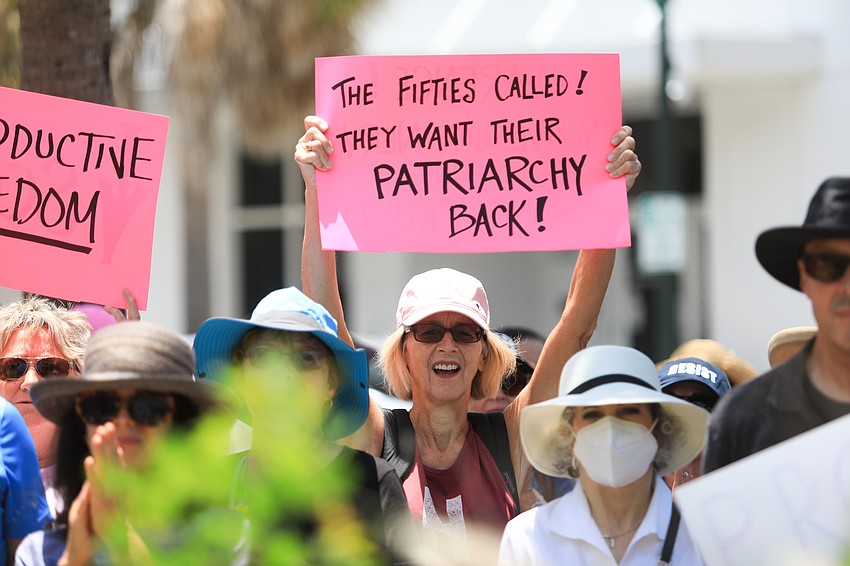 Hundreds marched through the Rosemary District.