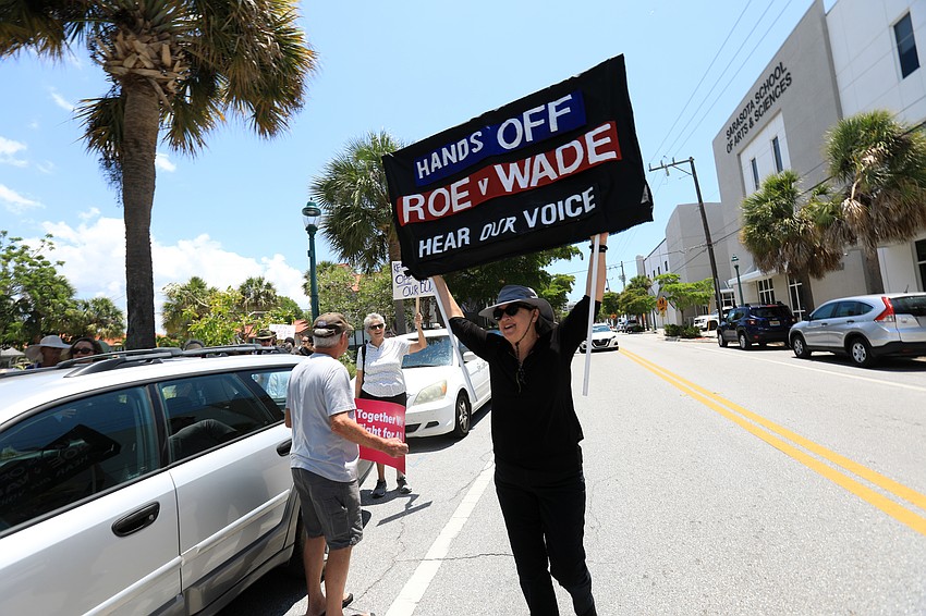 Deborah Hamm walks with the crowd.