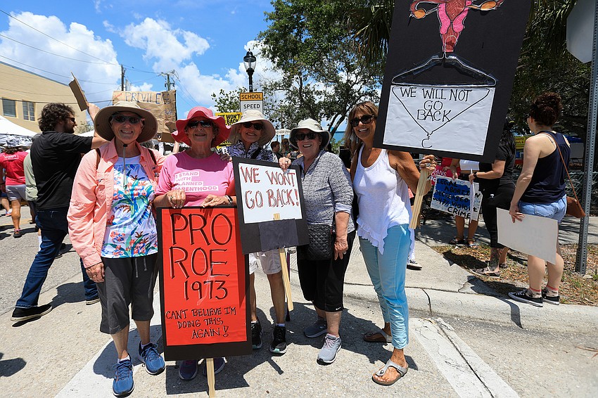 Linda McKenna, Lisa Nailburg, Lynnie Silverman and Myrna Memoli attend the march.
