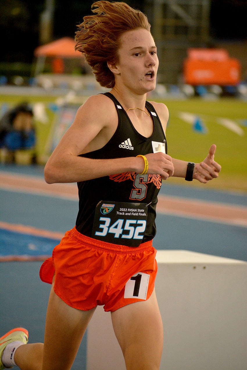 Sarasota High junior Alec Miller sprints to the finish line during the Class 4A boys 1,600 meter run at the FHSAA championships in Gainesville. Miller finished second (4:13.50).