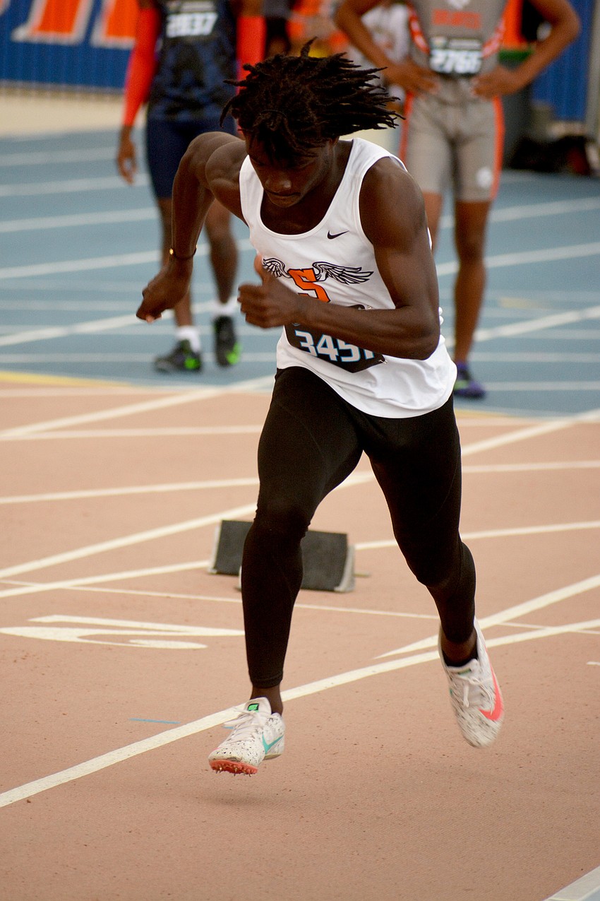 Sarasota High senior T.J. McKay takes off during the Class 4A boys 100 meter dash at the FHSAA state championships in Gainesville. McKay would finish 16th (10.99 seconds).