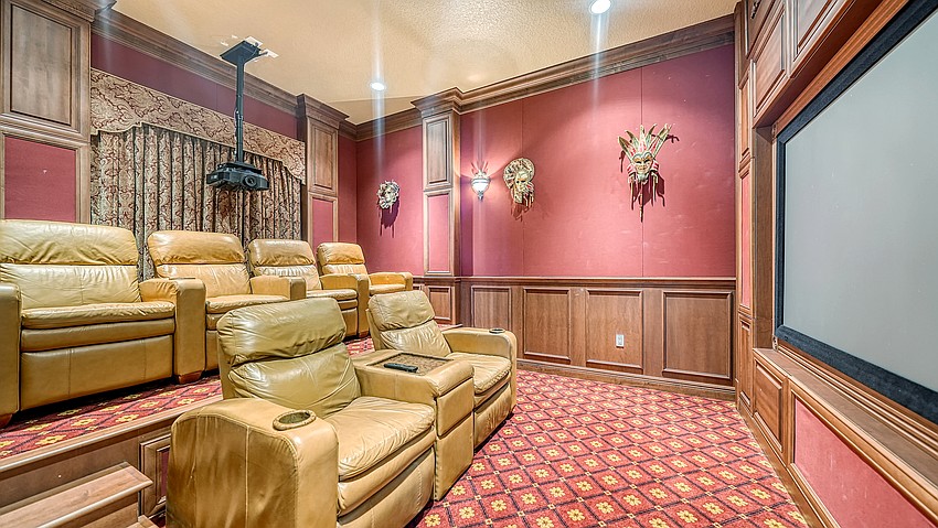 A media room is on the first level of the home.