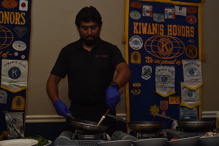 Gabriel Garcia makes an omelet.