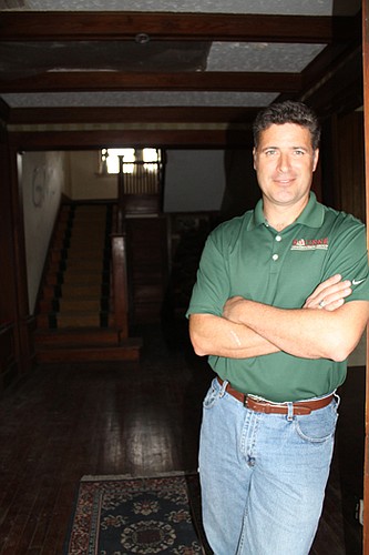 Michael BourrÃ© in Drew Mansion.