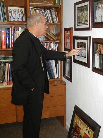 EstÃ©vez, a native of Cuba, displays photos, books, artwork and his official papal appointments in his office in the Catholic Center in Mandarin.