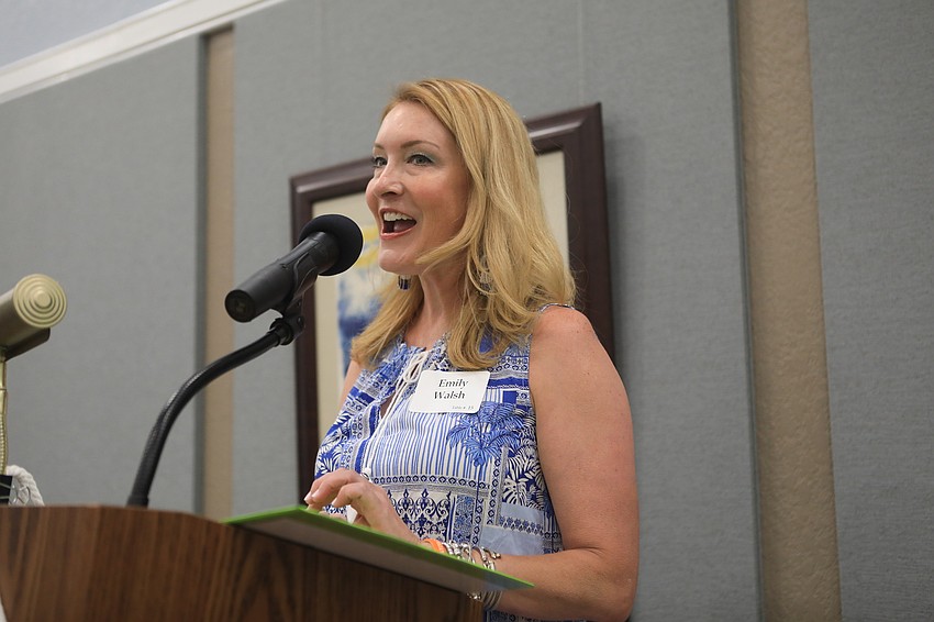 Emily Walsh welcomes the crowd.