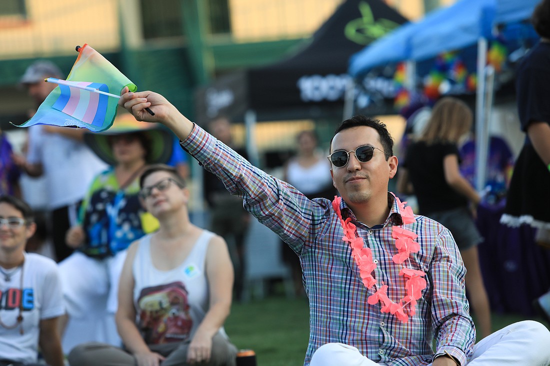 Eduardo Anaya waves flags in support at Fabulous Arts Foundation's 2022 Be Fabulous arts and music festival