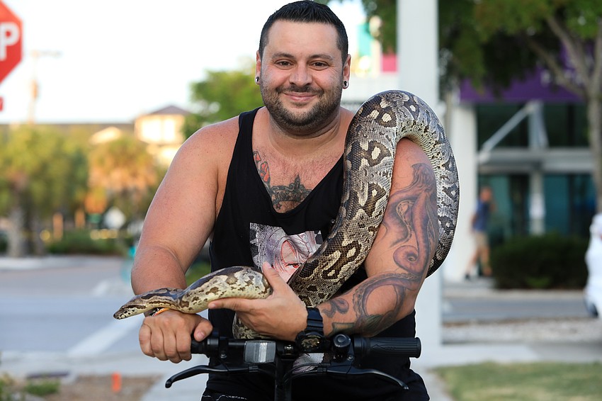 Jeff Capozzi with Coco the boa constrictor.