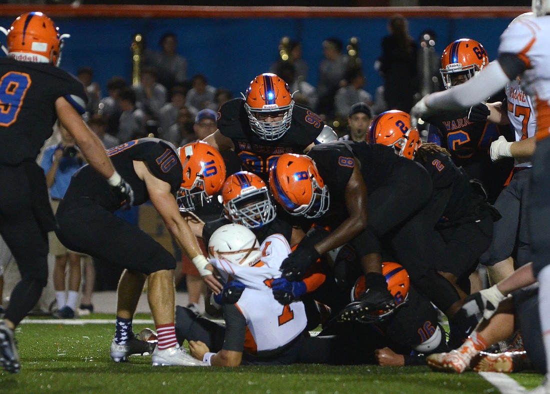 The Warriors showed no mercy in defeating Boone 49-6 in the first round of the playoffs Nov. 13.