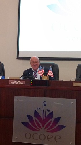 New Mayor Rusty Johnson smiles during his first Ocoee City Commission meeting as mayor.