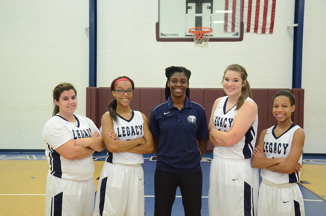 Cortnie Vees, Chloe Guy, Coach Blessing Freeman, Tiffany James and Tya Freeman look forward to leading the Legacy Charter girls basketball program to a successful first season.