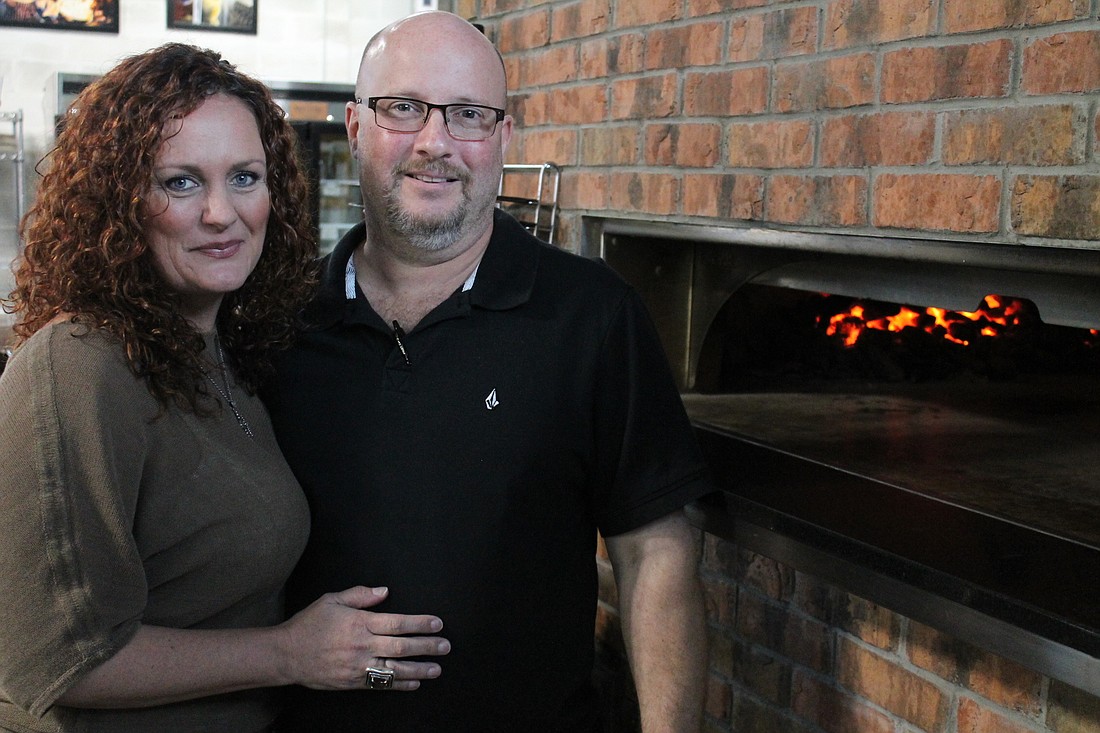 Alison McBride Wright and Michael Scorsone ordered a custom oven from Washington to make coal-fired pizza.