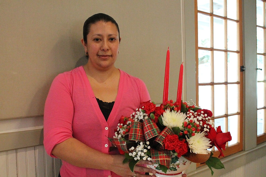 Imelda Jimenez is a floral designer at Betty Jâ€™s Florist.