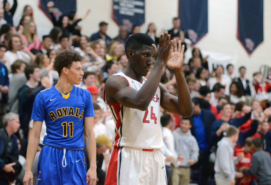 Windermere Prep's Xion Golding celebrates in the final moments of the Lakers' win over The First Academy.