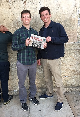 Jacob Lightman and Mark Epstein took a copy of their favorite community newspaper on a recent trip to the Western Wall in Jerusalem, Israel.
