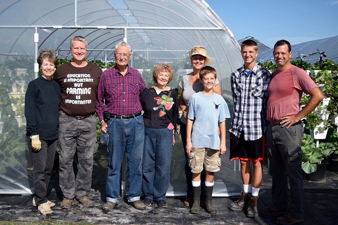 Some members of the Bekemeyer family who work the farm on weekends. From left to right: Jan Walls, John Bekemeyer, George Bekemeyer, Nancy Bekemeyer, Nancy Walker, William Walker, Bryce Walker and Jason Walker.