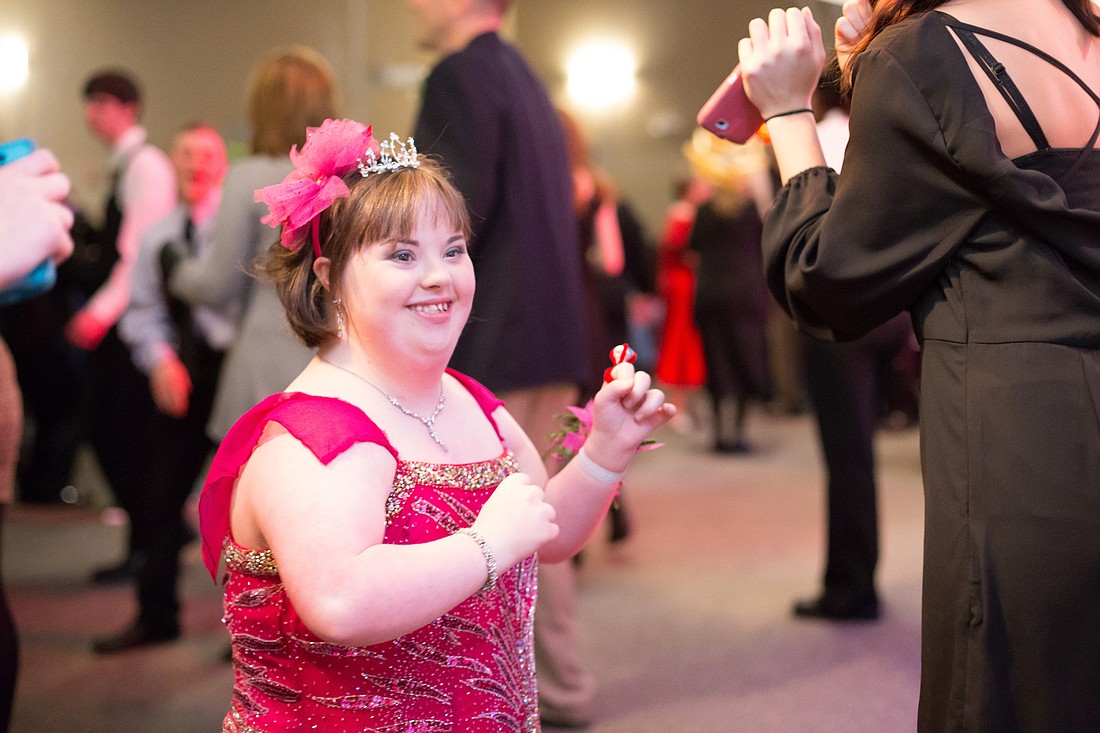 A guest at a Night to Shine prom last year got all dolled up for the event.