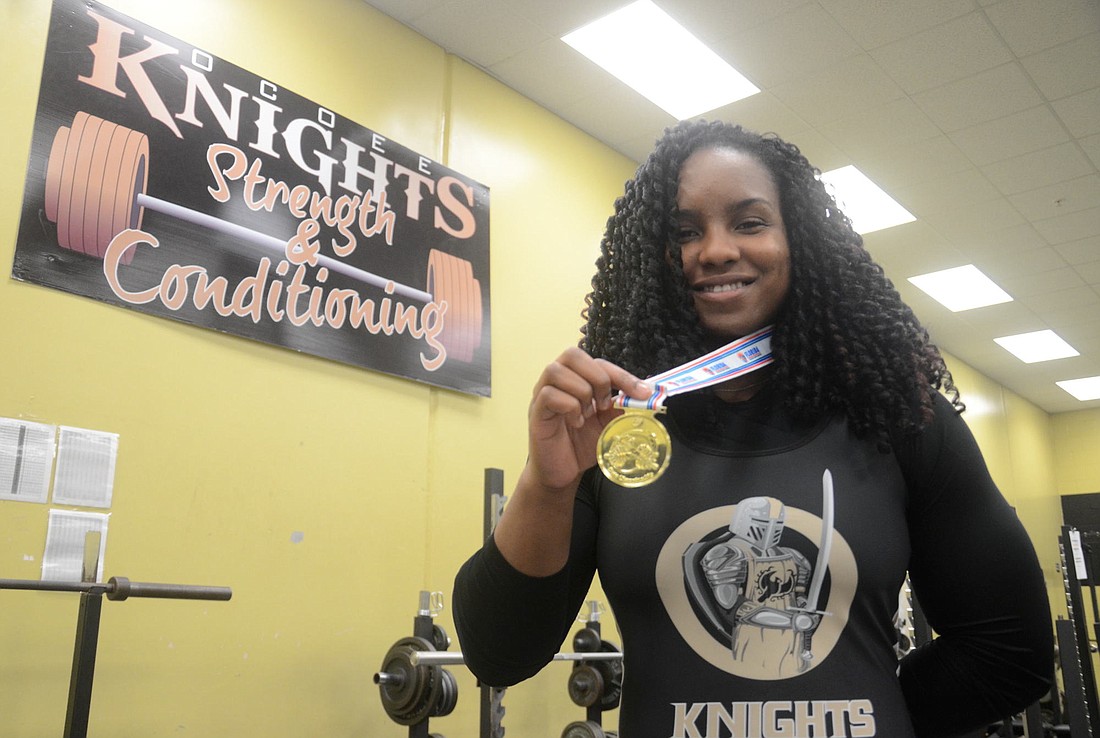 Ocoee High junior Victoria Jefferson shows off her state championship medal.