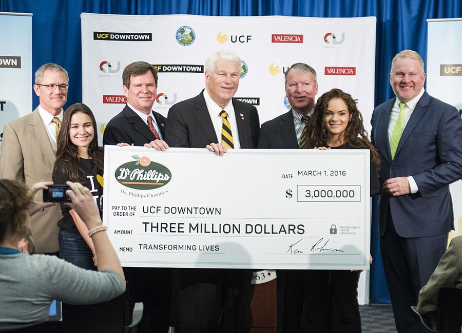 Dr. Phillips Charities presented UCF with a check for $3 million on March 1 to go toward the first academic building of the UCF downtown campus.