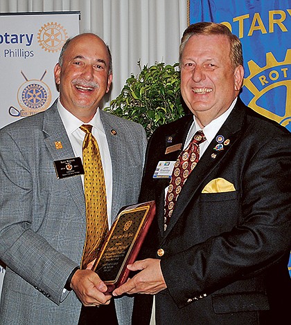 CLUBS-Past President Ross Marvin congratulates Rotarian of the Year John Winemiller