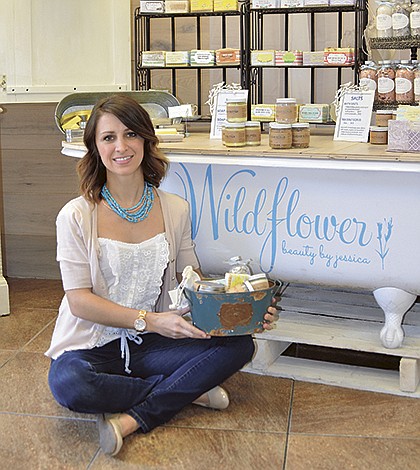 Budding entrepreneur sells natural skin care products from downtown W.G. shop