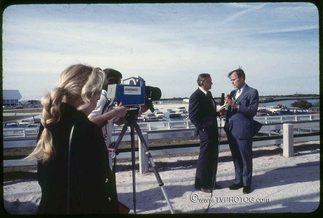 Photo by: Roger Scruggs - Anchor Ben Aycrigg, left, interviews Vice President George Bush at the Kennedy Space Center Press Site in 1981 for WDBO TV 6.